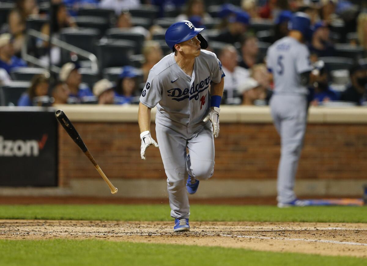 Dodgers' Will Smith tosses his bat after hitting a solo home run against the New York Mets.