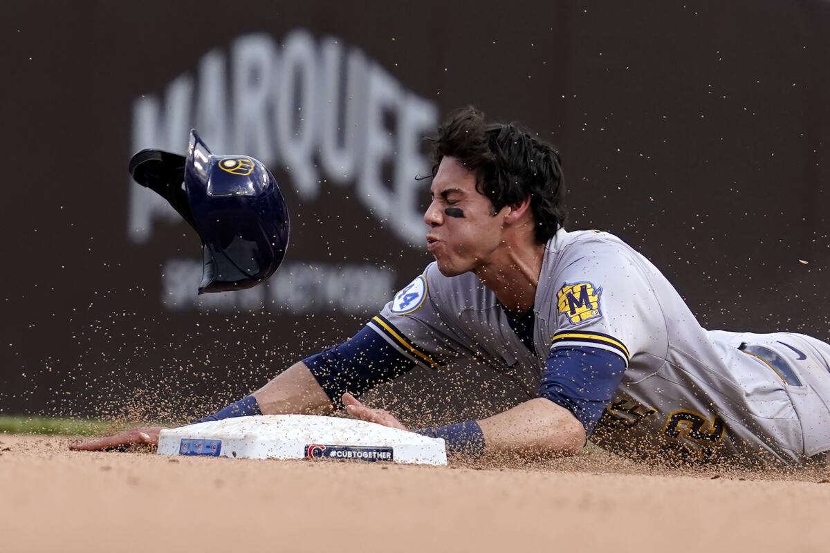 Milwaukee Brewers outfielders Christian Yelich and Lorenzo Cain
