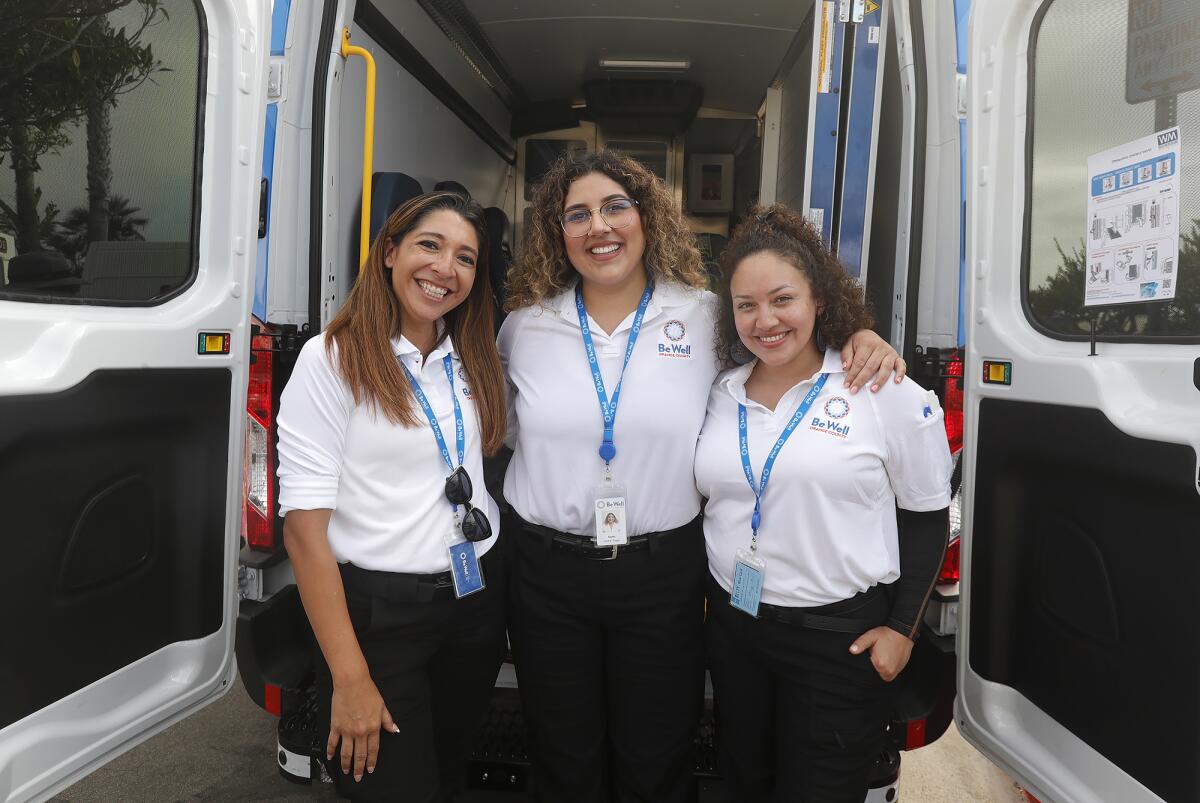 The Be Well OC van crew of Davina Serna, Sami Levesque and Zelda Aguirre.