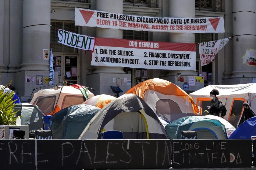 Pro-Palestinians protesters set up tents in front of Sproul Hall at UC Berkeley in Berkeley, Calif., Thursday, May 2, 2024. (AP Photo/Jeff Chiu)