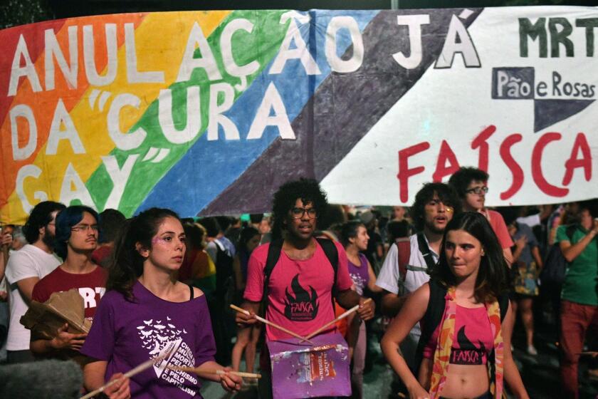 People protest against the decision of a Brazilian judge who approved gay conversion therapy in Sao Paulo, Brazil on September 22, 2017. Brazilian federal judge Waldemar de Carvalho overruled a 1999 decision by the Federal Council of Psychology that forbade psychologists from offering widely discredited treatments which claims to cure gay people. / AFP PHOTO / NELSON ALMEIDANELSON ALMEIDA/AFP/Getty Images ** OUTS - ELSENT, FPG, CM - OUTS * NM, PH, VA if sourced by CT, LA or MoD **