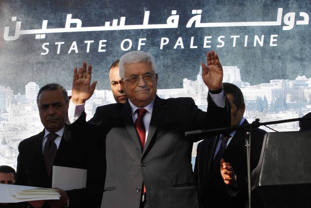 Palestinian Authority President Mahmoud Abbas celebrates in Ramallah after the U.N. vote.
