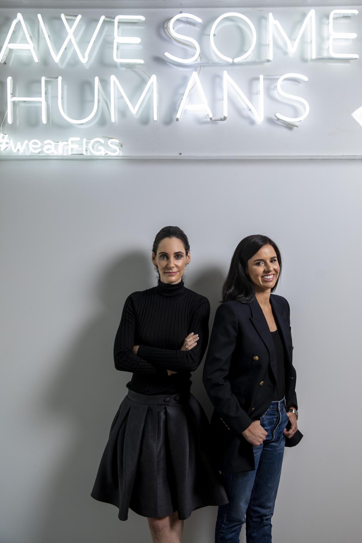 Two women who lead a company.