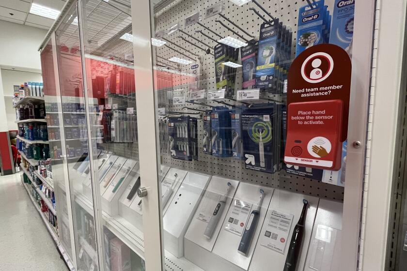 Toothbrushes are among the many products now locked behing security glass at a Target in Pasadena.