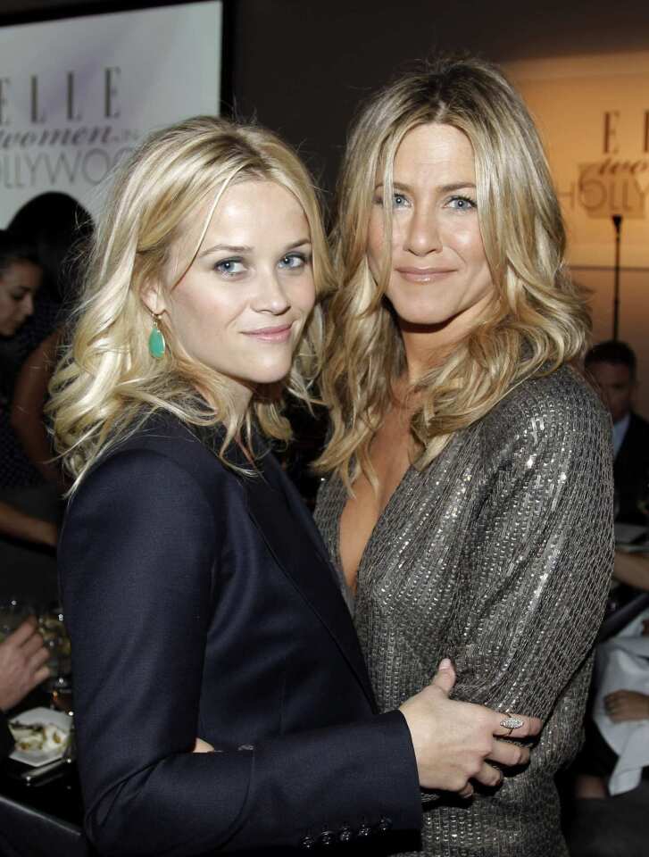 Actresses Jennifer Aniston and Reese Witherspoon were among the honorees at the ELLE Women in Hollywood celebration in Beverly Hills, Calif. Introducing honoree Aniston, Witherspoon celebrated the "Friends" alum's rare combination of "sex appeal and complete loveability. You want to get your nails done with her, and then make out with her. At least I do." RELATED: Jennifer Aniston, Barbra Streisand rock Elle Women in Hollywood