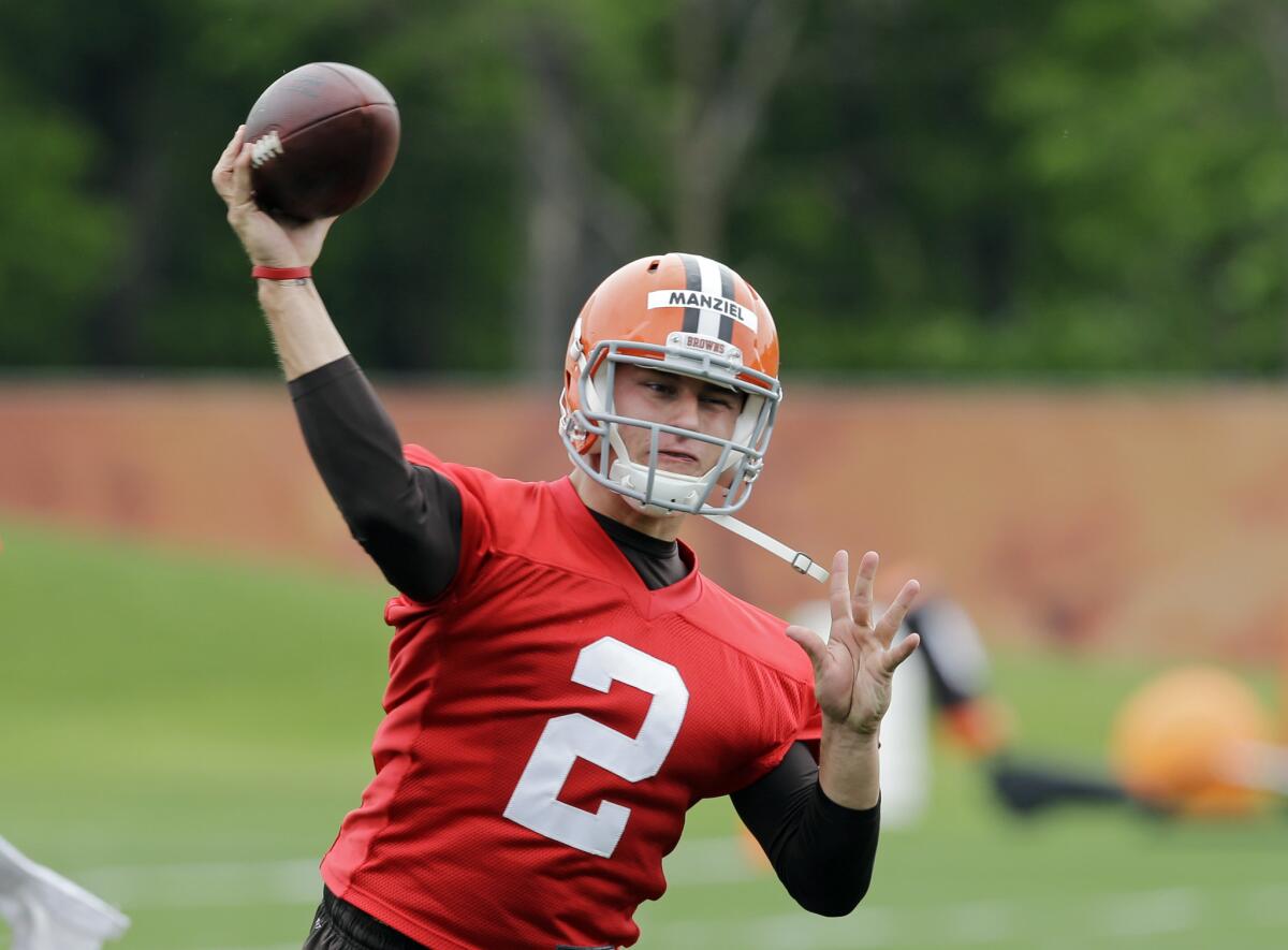 Cleveland Browns quarterback Johnny Manziel passes during organized team activities Wednesday in Berea, Ohio.