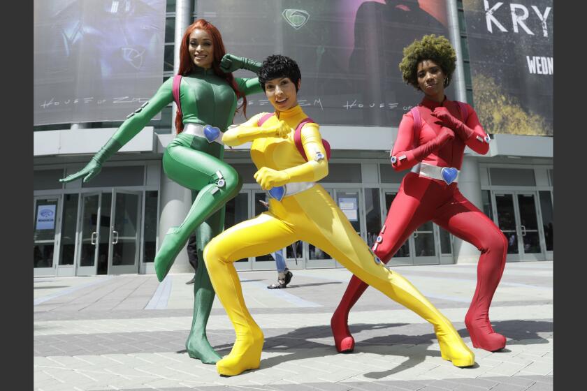 AWe spy "Totally Spies": Alicia Marie, left, Utahime and Krystina Arielle take on WonderCon at the Anaheim Convention Center.