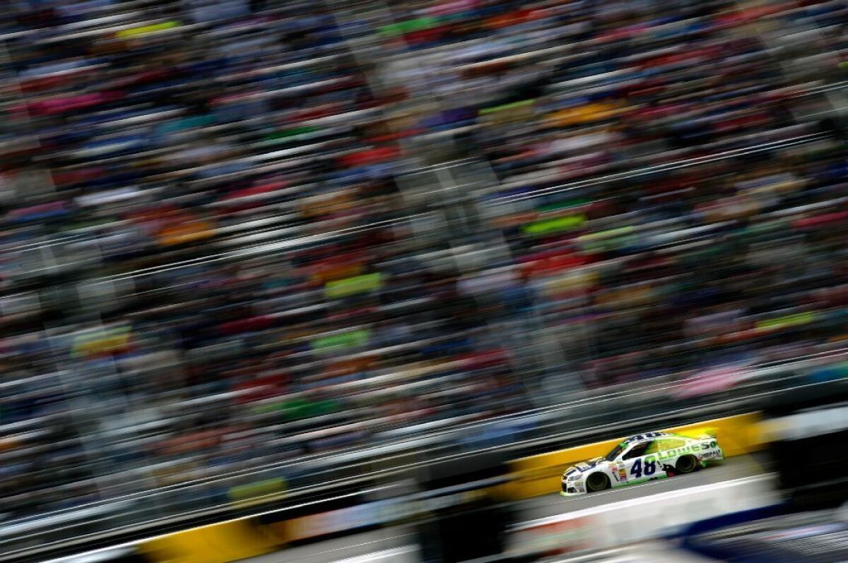 Jimmie Johnson races in the NASCAR Sprint Cup Series STP 500 at Martinsville (Va.) Speedway on Sunday.