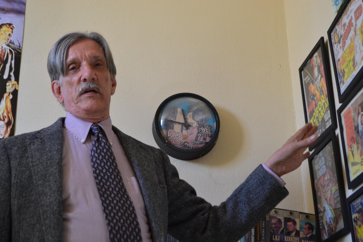 Roger Guy English talks about his love of movies in his Poway home. 