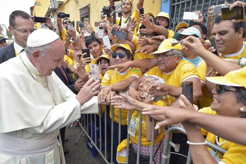 Handout picture released by Osservatore Romano shows Pope Francis greeting crowds in the Peruvian city of Trujillo, on January 20, 2018. Pope Francis condemned "organized crime" and prayed for flood victims during a giant open air mass at a beach in Trujillo, Peru's crime-plagued largest northern coastal city. Francis acknowledged the "insecurity" due to the high crime rate in the region, still struggling to rebuild after deadly devastating floods one year ago. / AFP PHOTO / OSSERVATORE ROMANO / HO / RESTRICTED TO EDITORIAL USE - MANDATORY CREDIT "AFP PHOTO / OSSERVATORE ROMANO" - NO MARKETING NO ADVERTISING CAMPAIGNS - DISTRIBUTED AS A SERVICE TO CLIENTS HO/AFP/Getty Images ** OUTS - ELSENT, FPG, CM - OUTS * NM, PH, VA if sourced by CT, LA or MoD **