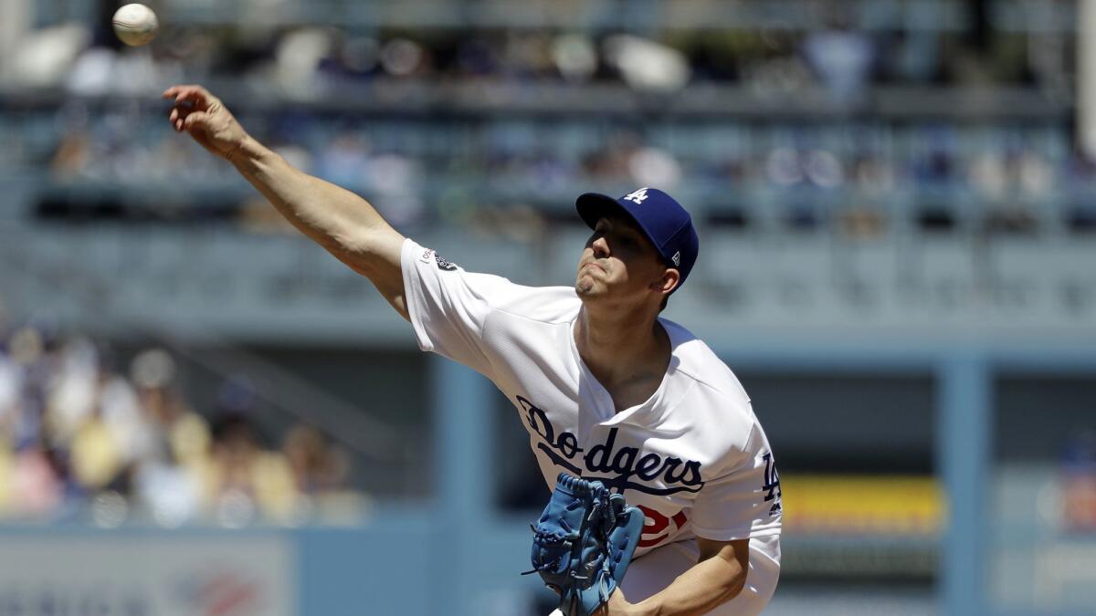 Dodgers starting pitcher Walker Buehler throws against the Cincinnati Reds during the second inning Wednesday.