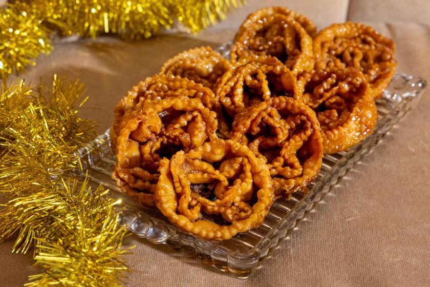 LOS ANGELES, CA - NOVEMBER 14, 2023: Crispy and sticky Italian cartellate cookies from Michelangela "Lina" Pompilio, a member of the Garibaldina Society, photographed on Tuesday, Nov. 14, 2023, at the Garibaldina Society in Los Angeles, CA. (Silvia Razgova / For The Times)