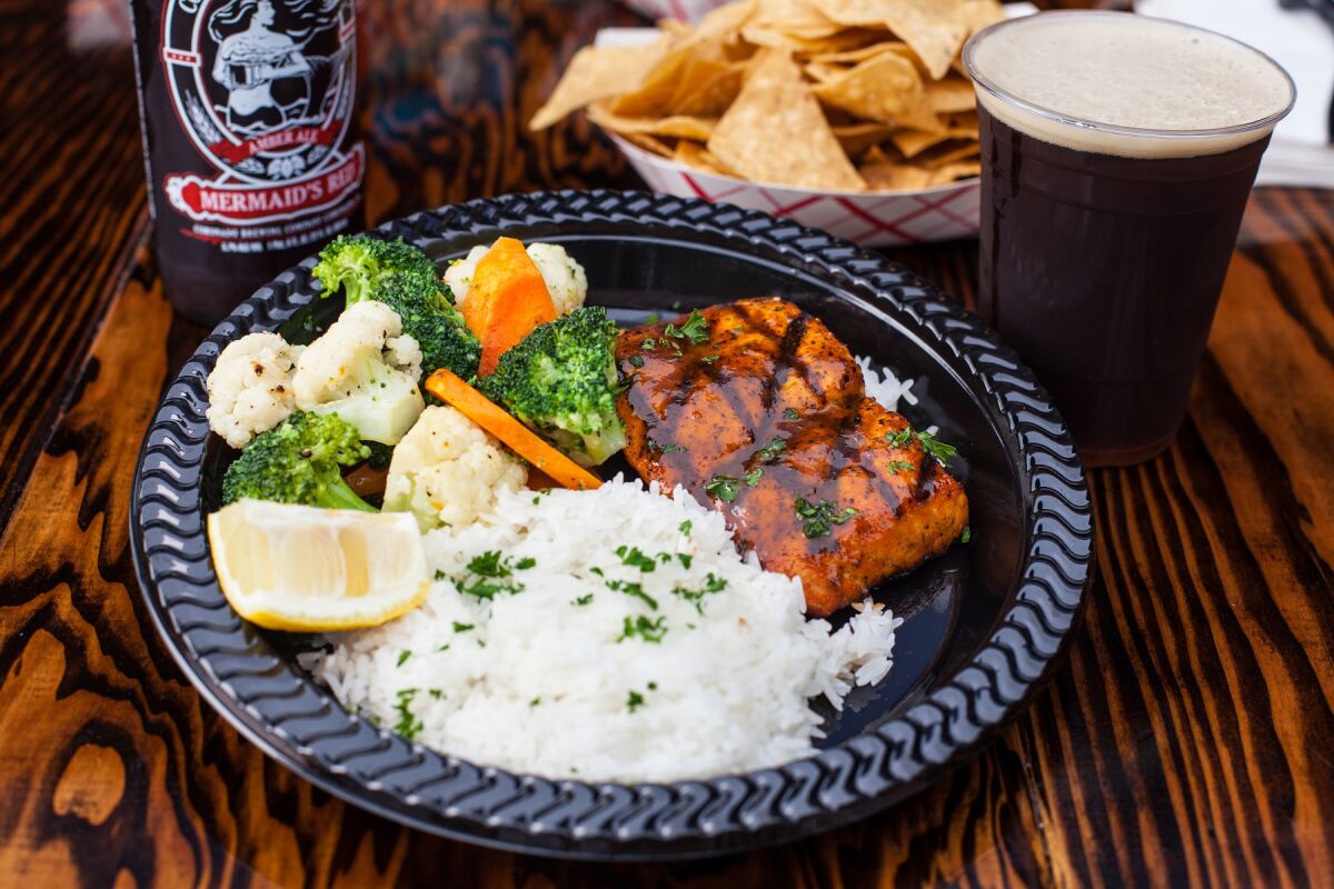 A marinated salmon plate is one of the specialties at Point Loma Fish Shop.