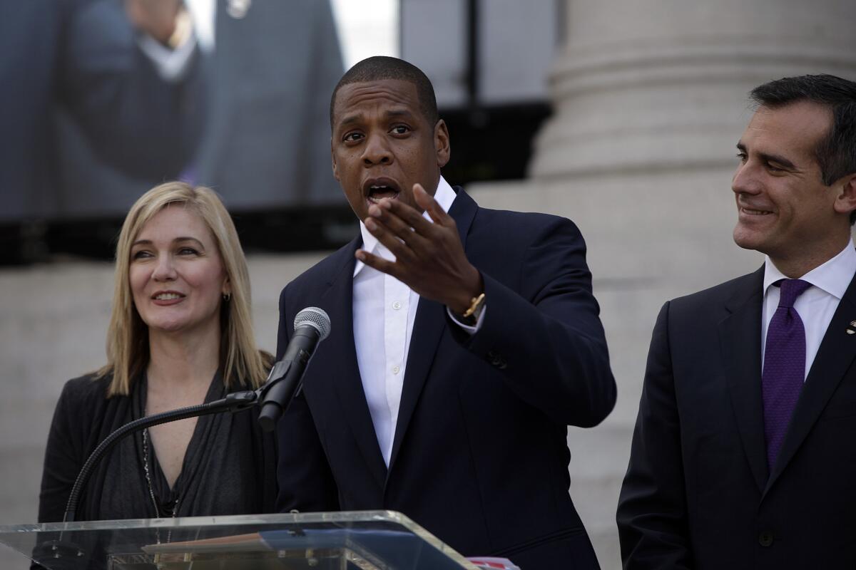 Jay Z and Live Nation promoters say they'll pay $850,000 to cover municipal costs for the Labor Day music festival at Grand Park in downtown Los Angeles.