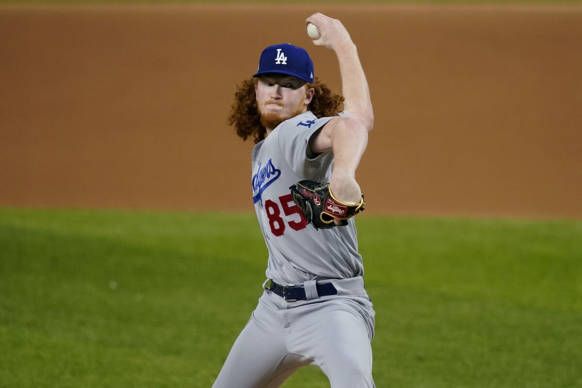 Los Angeles Dodgers starting pitcher Dustin May delivers to the San Diego Padres.