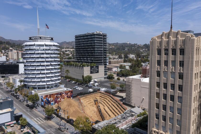 HOLLYWOOD, CA - APRIL 15: A giant trench is being dug next door to the Capitol Records building to determine if an earthquake fault runs under the site on Thursday, April 15, 2021 in Hollywood, CA. (Brian van der Brug / Los Angeles Times)