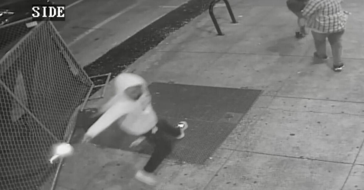 Man is seen in this image firing his gun in downtown Sacramento.