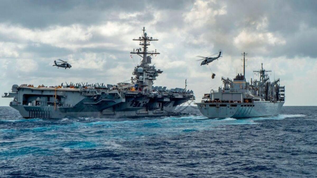 The U.S. aircraft carrier Abraham Lincoln, shown on May 8, is part of a group of ships being sent to the Persian Gulf, ratcheting up pressure on Iran.