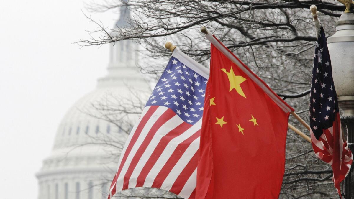 Chinese and U.S. flags are displayed in Washington, D.C.