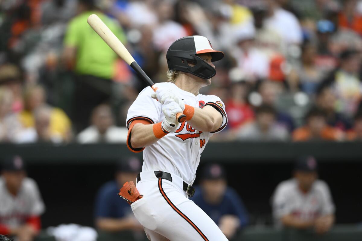 Baltimore Orioles' Kyle Stowers follows through on an RBI single during the seventh inning of a baseball game against the Boston Red Sox, Monday, May 27, 2024, in Baltimore. (AP Photo/Nick Wass)