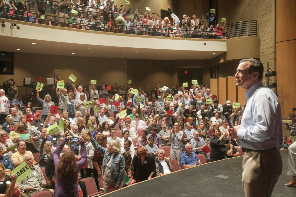 Rep. Darrell Issa (R-Vista) speaks at a town hall meeting in San Juan Capistrano on Saturday.