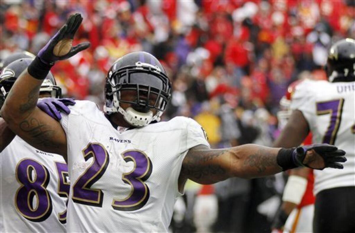 Baltimore Ravens running back Willis McGahee (23) is tackled by