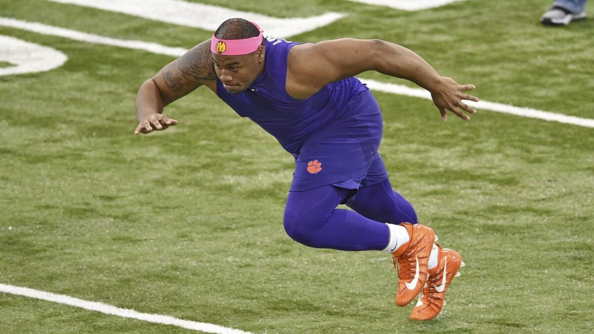 Dexter Lawrence runs a drill during Clemson's pro day on March 14.