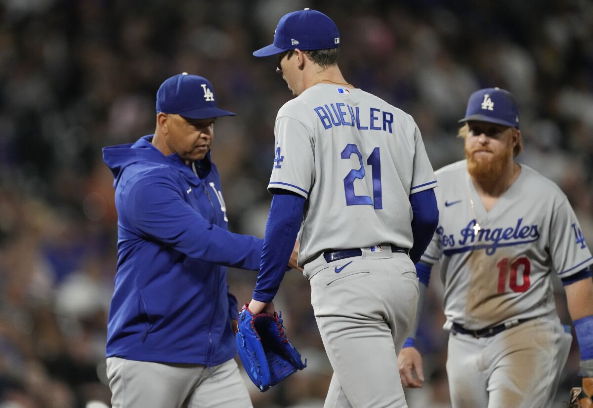 Walker Buehler is removed from Wednesday's game in the fourth inning.