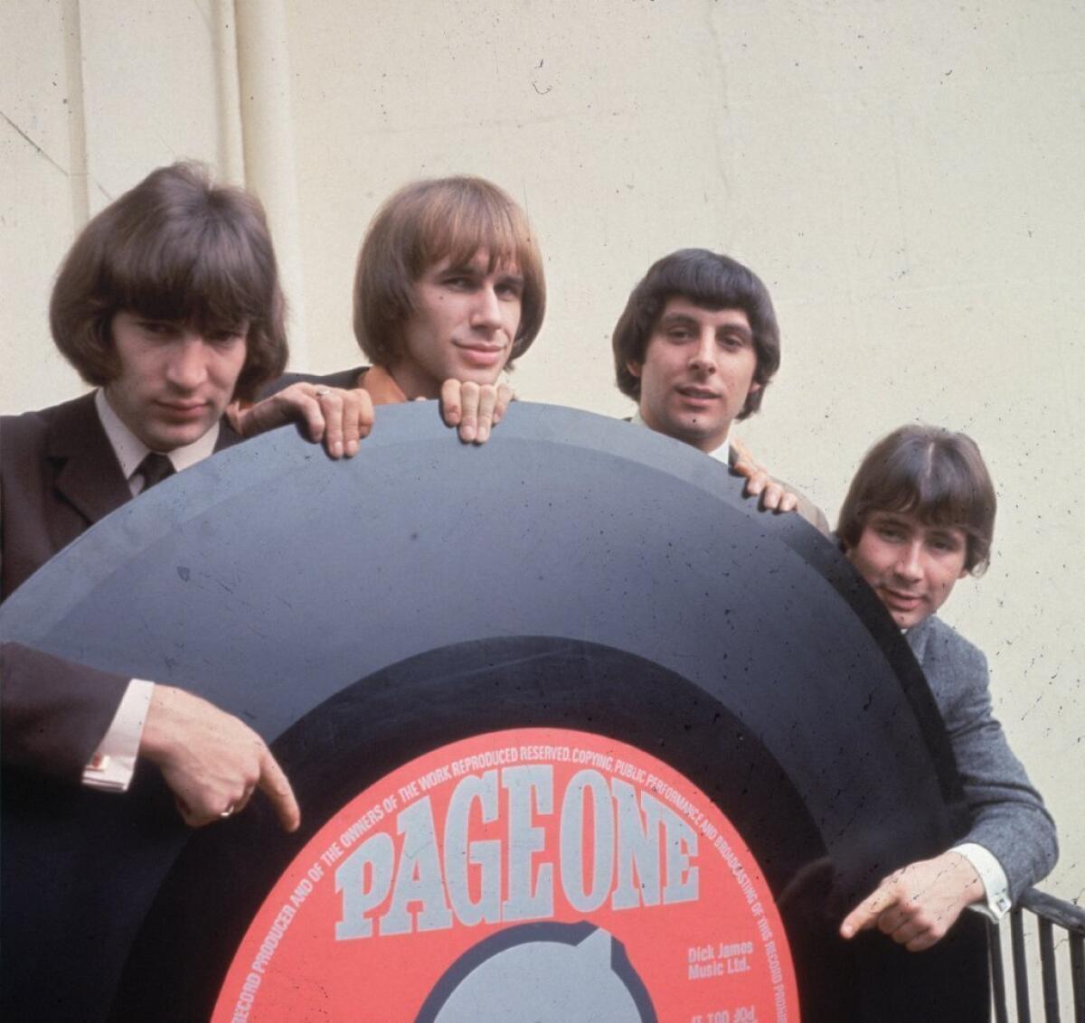 Reg Presley, far right, of the '60s band the Troggs, died Monday at age 71.
