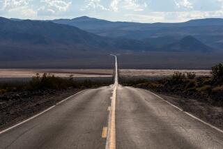 Death Valley, CA - July 16: A view of HWY 190 to Death Valley National Park, on Sunday, July 16, 2023, in Death Valley, CA. The heat is extremely high here this afternoon. (Francine Orr / Los Angeles Times)