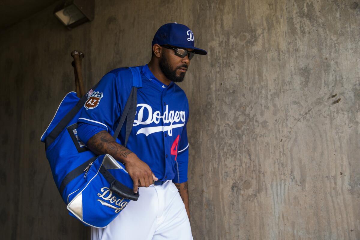 Dodgers second baseman Howie Kendrick looks on before a spring training game against the Chicago White Sox on March 3.