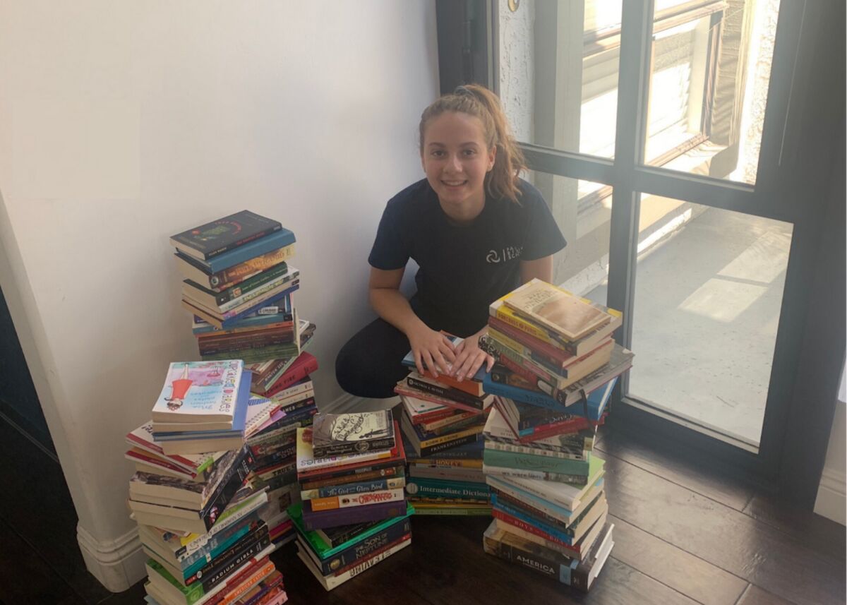 Alexis Shenkiryk started the Pages & Pieces book and puzzle drive.