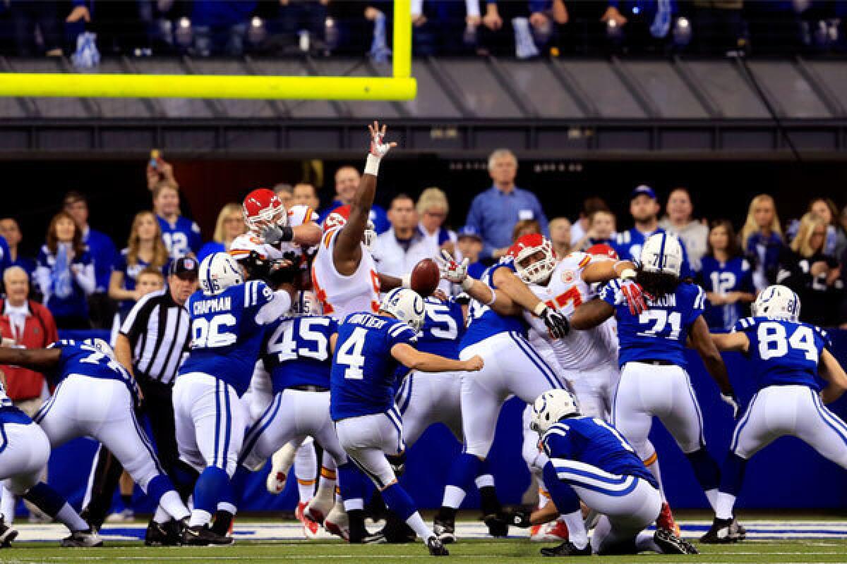 Indianapolis' Adam Vinatieri kicks an extra point against the Kansas City Chiefs during a wild-card in January.