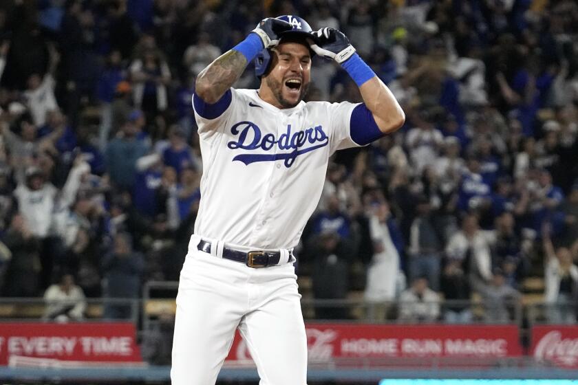Los Angeles Dodgers' David Peralta celebrates after hitting a two run walk-off single.