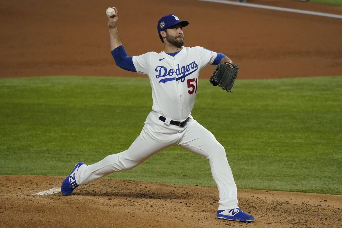 Dodgers relief pitcher Dylan Floro throws against the Tampa Bay Rays during the second inning of Game 6.