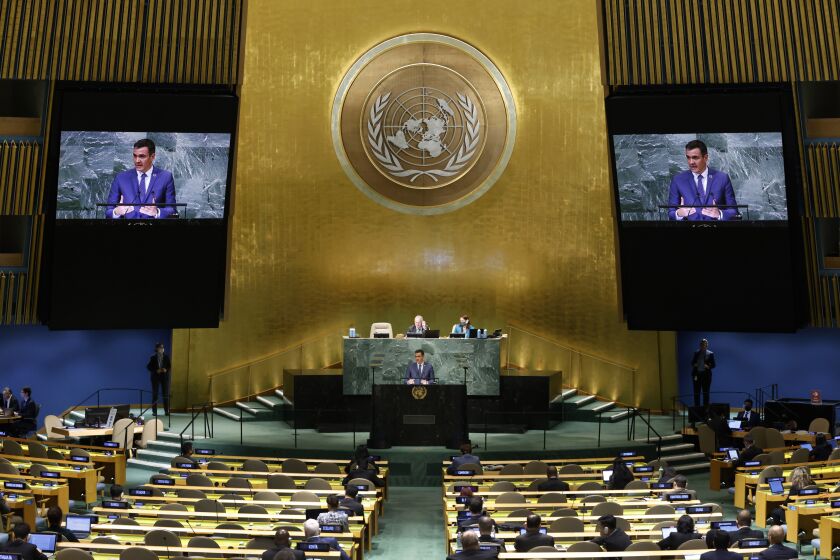 President of Spain Pedro Sanchez, center bottom, addresses the 77th session of the United Nations General Assembly at U.N. headquarters, Thursday, Sept. 22, 2022. (AP Photo/Jason DeCrow)