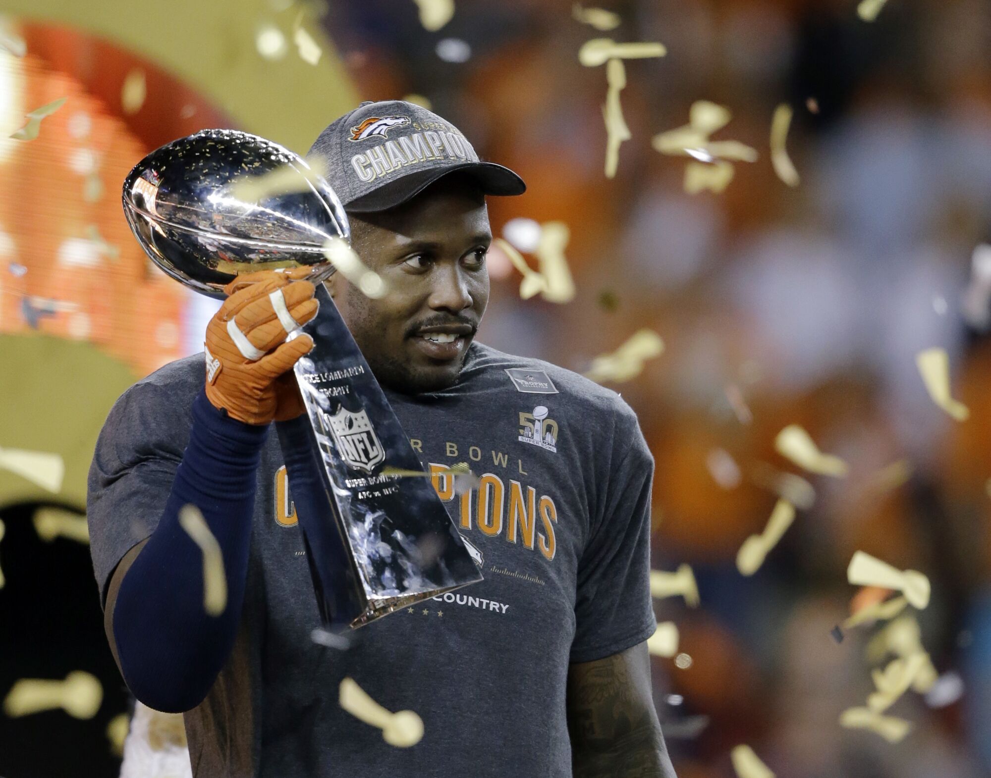 Von Miller holds the Lombardi Trophy after the Broncos defeated the Panthers in Super Bowl 50.