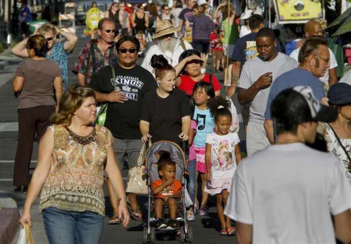 A crowd in Lancaster in 2011. Scientists are delving into the genetic variations that contribute to human diversity.
