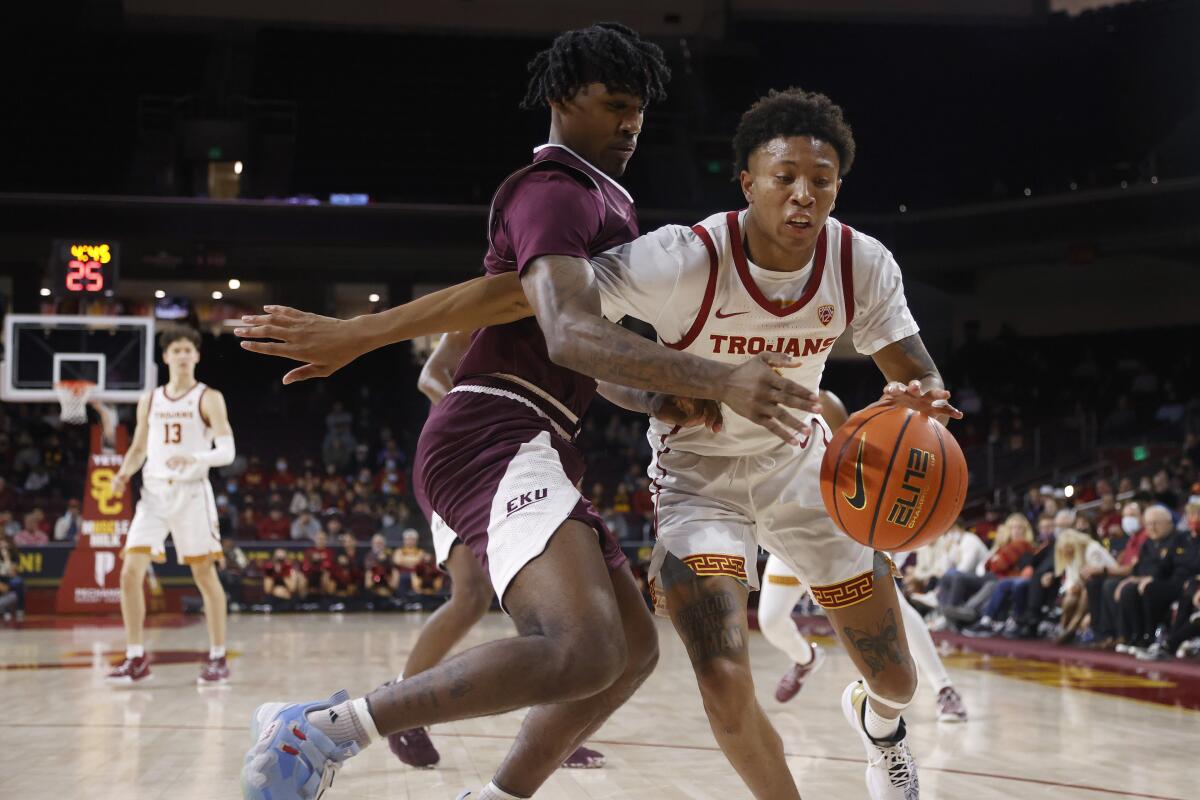 USC guard Boogie Ellis drives past Eastern Kentucky guard Dashawn Jackson.