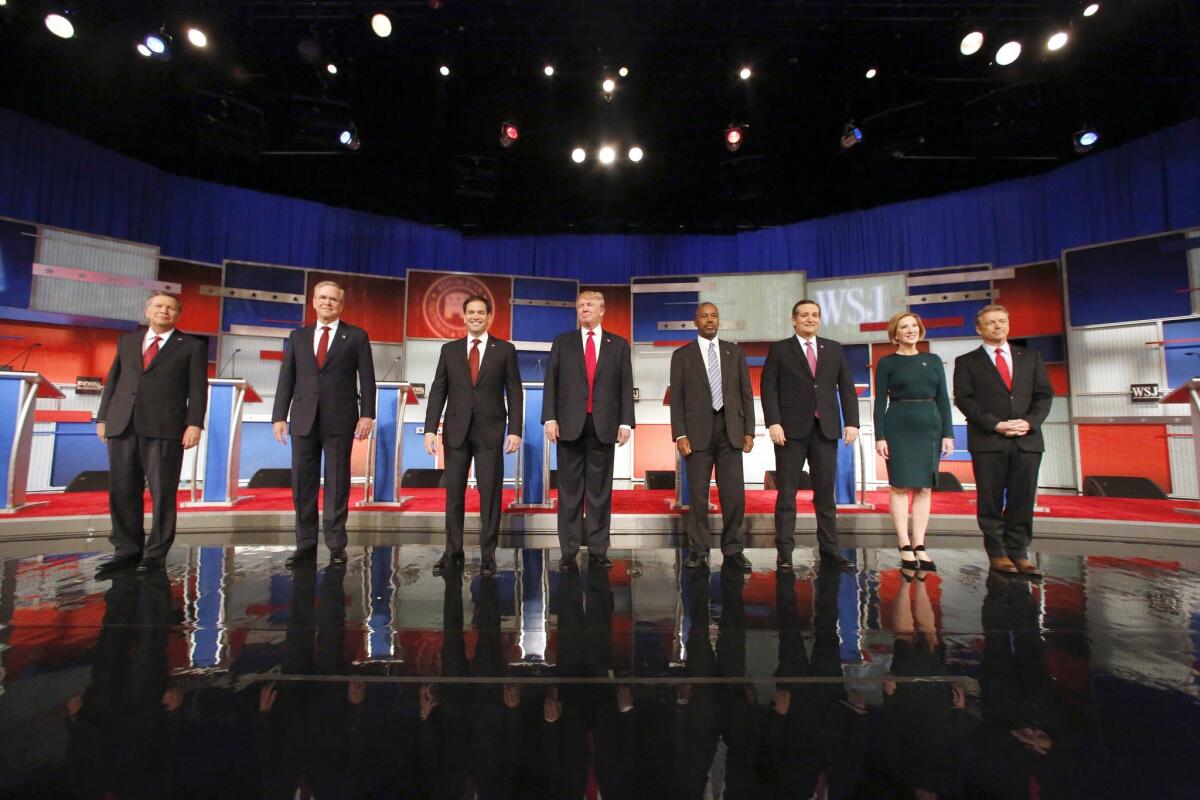 Republican presidential hopefuls, shown in November, return Tuesday night to the debate stage.