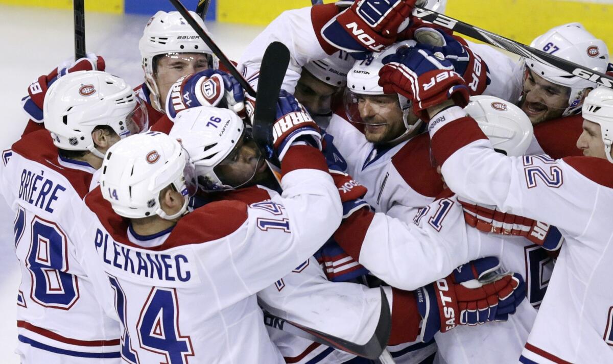 The Montreal Canadiens celebrate P.K. Subban's game-winning goals in the second overtime of Game 1 against the Boston Bruins. The Canadiens won 4-3.