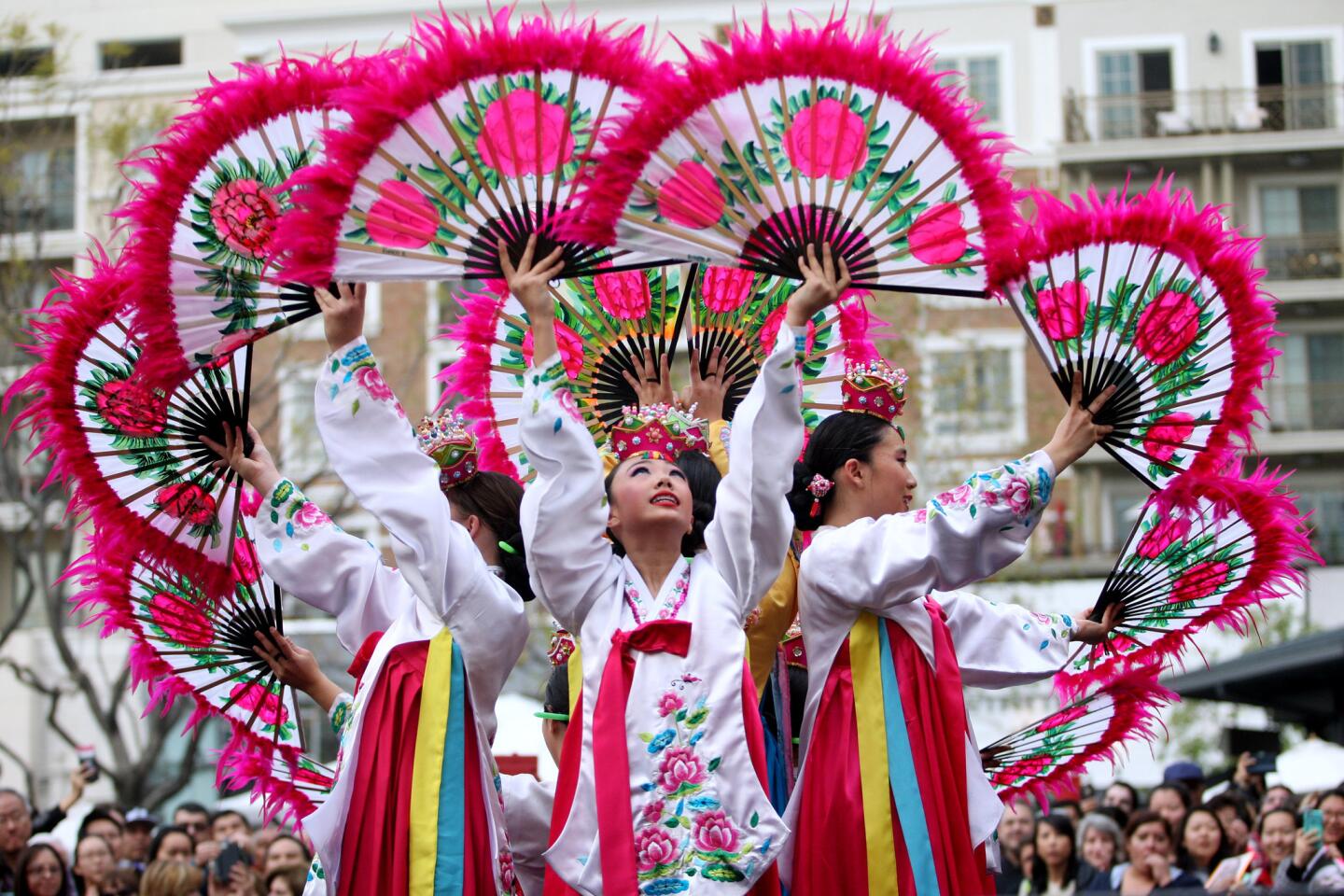 Hundreds of attendees watched performances by various acts, including the fan dance by the Kim Eung Hwa Korean Dance Company, at the Americana At Brand's Lunar New Year Celebration in Glendale on Saturday, Jan. 30, 2016. The event included the Lion Dance, the Dragon Dance, and an appearance by some of the actors from the hit television show Fresh Off The Boat.