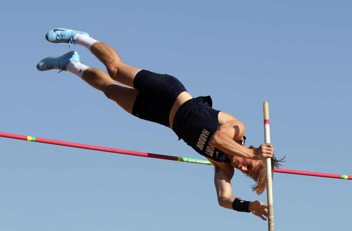 Newport Harbor's Leo Davis clears 13 feet, 9 inches in the boys' pole vault competition of the Arcadia Invitational.