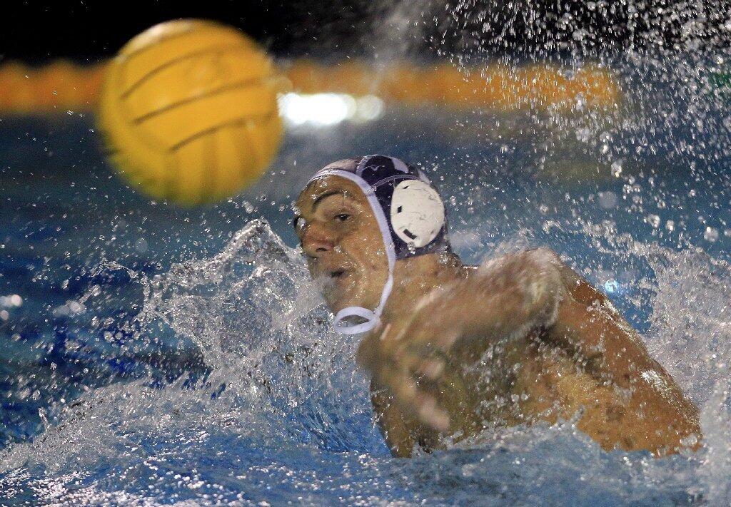 Newport Harbor High's Mitchell Mendoza attempts to score during the first half against Corona del Mar in the Battle of the Bay game on Saturday.
