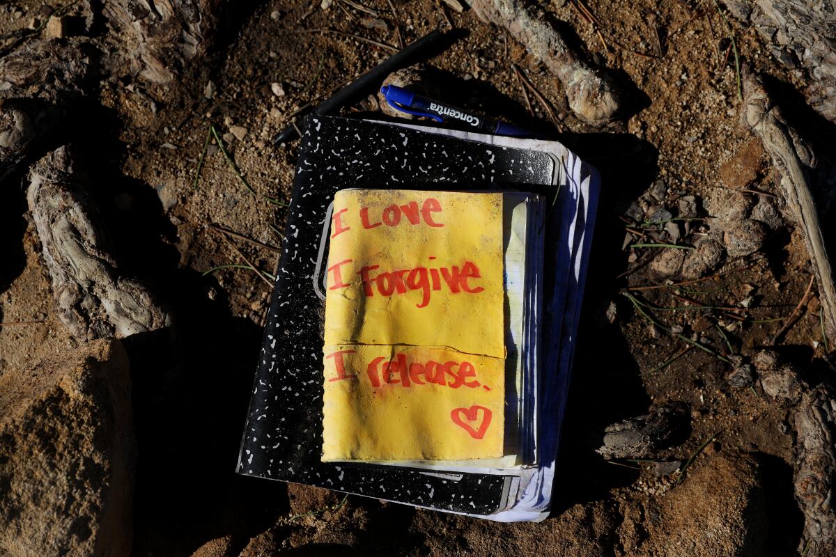 Notebooks sit beneath the Wisdom Tree in Griffith Park.