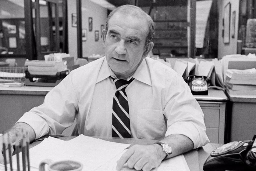 @@*@@*ADVANCE FOR MONDAY DEC. 3 @@*@@*@@*@@* FILE @@*@@* Ed Asner is shown in character as he portrays the city editor of the Los Angeles Tribune behind his office desk on the television drama "Lou Grant" in Los Angeles, Ca., in this Jan. 13, 1978 file photo. When everyone but idiotic anchorman Ted Baxter was fired from WJM News in 1977, Mary Richards and her fellow casualties were left reeling. It was a classically bittersweet finale for the beloved "Mary Tyler Moore" show after seven hit seasons. Then Mary's crusty boss, station news director Lou Grant, made a smooth transition. Within weeks, he had blown Minneapolis and snagged a good job in Los Angeles as city editor of The Tribune. (AP Photo/File)
