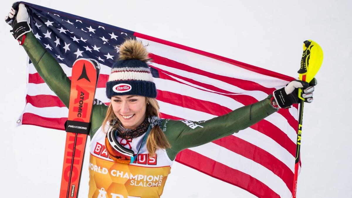 Mikaela Shiffrin celebrates after winning the gold medal in the slalom at the world championships on Saturday.