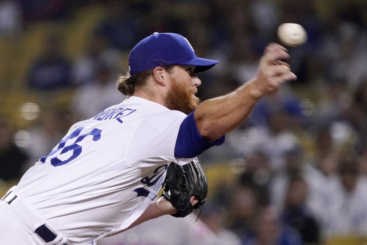 Dodgers relief pitcher Craig Kimbrel throws to the plate against the New York Mets on Thursday.