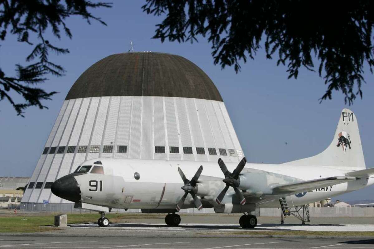 A Navy P-3 surveillance plane on display in front of a hanger at Moffett Field, near Google headquarters in Northern California, in 2007.