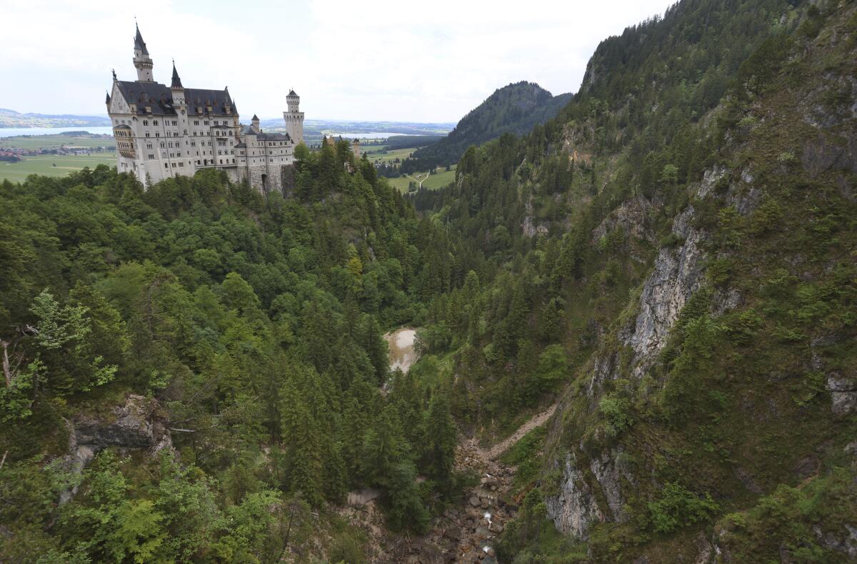 A view of the Pollat gorge with the Neuschwanstein castle in background in Schwangau, Germany.